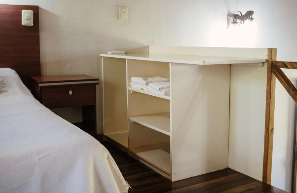 Postel nebo postele na pokoji v ubytování Complejo Paranay