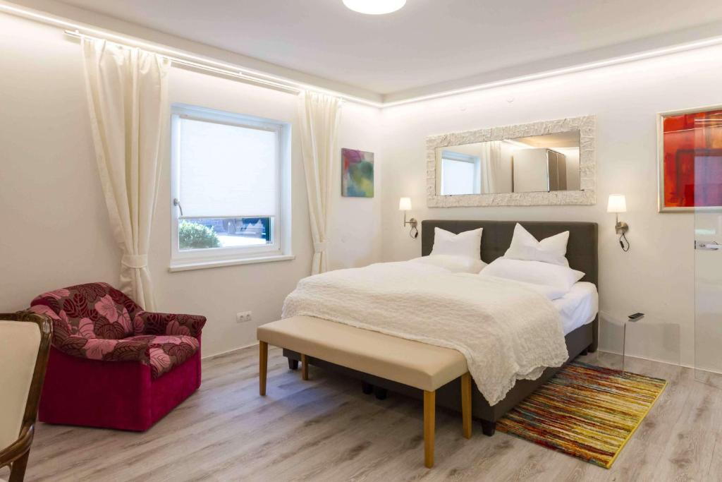 Postel nebo postele na pokoji v ubytování Seehaus Gaby