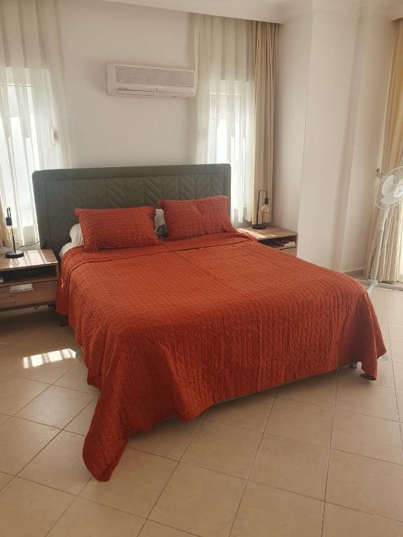 Postel nebo postele na pokoji v ubytování Mesan Golfing Villa