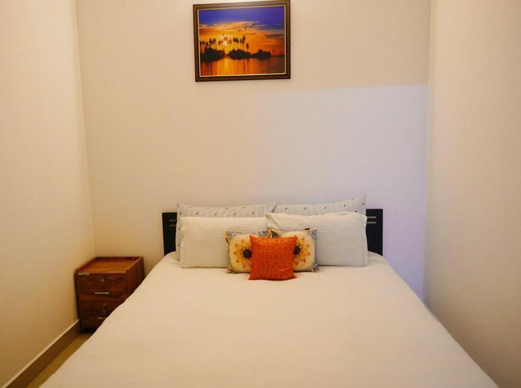 Postel nebo postele na pokoji v ubytování Fortis Rooms