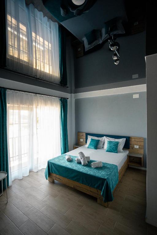 Postel nebo postele na pokoji v ubytování ADAMZ