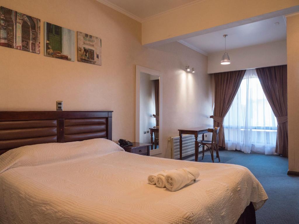 Postel nebo postele na pokoji v ubytování Hotel Econohotel