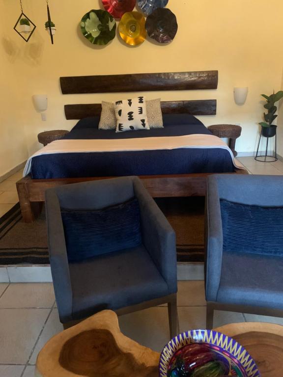 Cama ou camas em um quarto em Cabañas Las Morenas Mazamitla