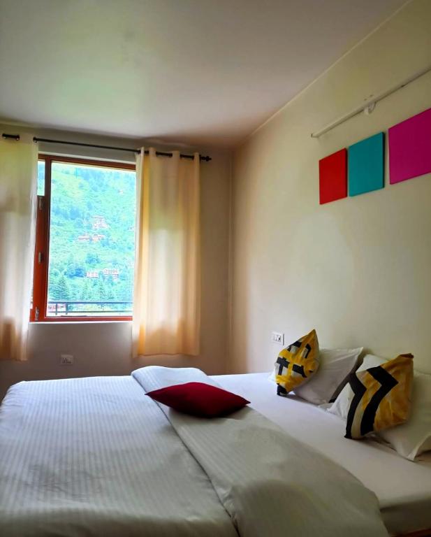 Postel nebo postele na pokoji v ubytování Farm Hostel & Camps