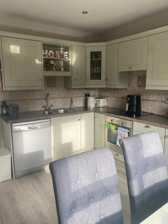 Kuchyň nebo kuchyňský kout v ubytování Cosy home
