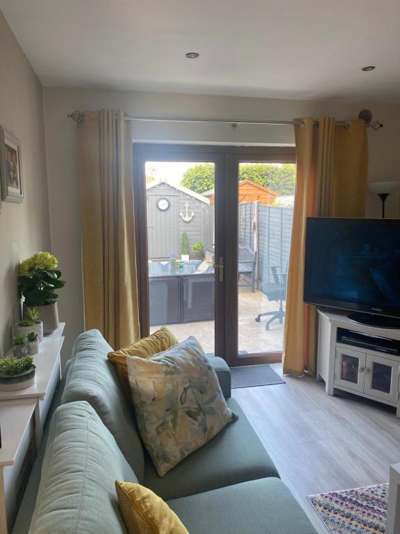 TV a/nebo společenská místnost v ubytování Cosy home