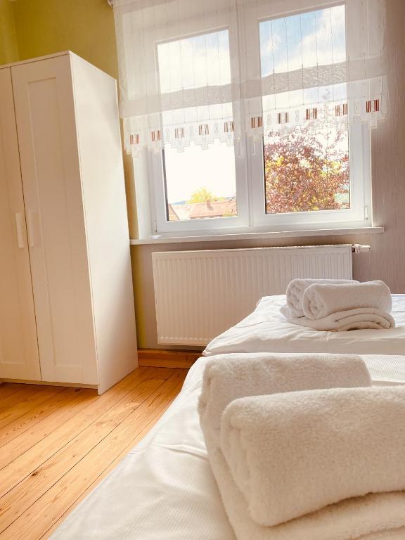 Postel nebo postele na pokoji v ubytování Ruhig, modern & Nähe Altstadt!