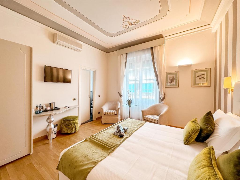 TV a/nebo společenská místnost v ubytování Hotel Jolanda