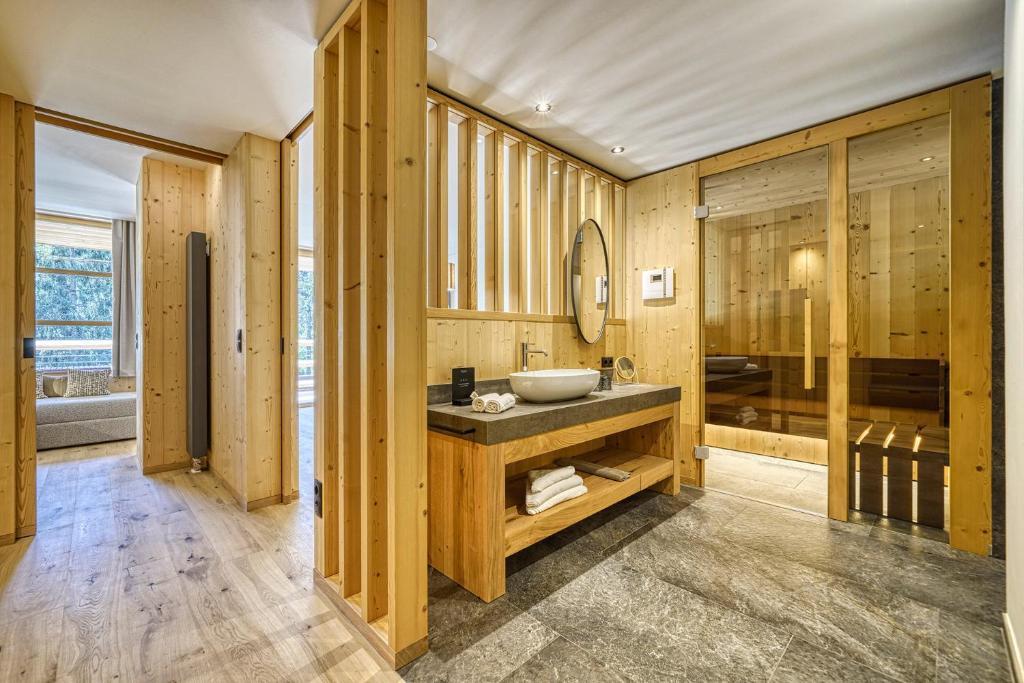 Postel nebo postele na pokoji v ubytování Hotel Pustertalerhof