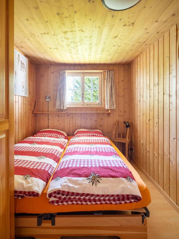 Voodi või voodid majutusasutuse Chalet am Sunne-Egge auf Axalp bei Brienz toas