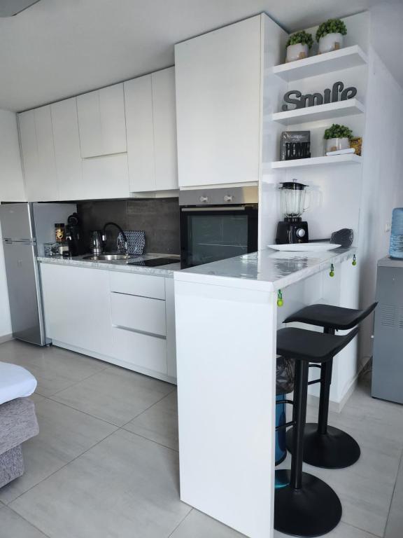 Kuchyň nebo kuchyňský kout v ubytování Apartments Merin
