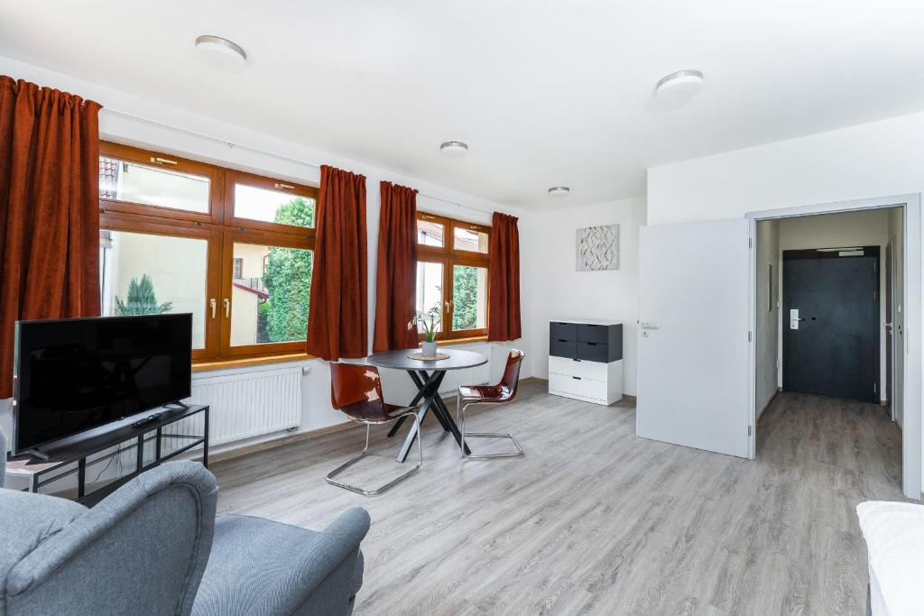 TV a/nebo společenská místnost v ubytování Apartmán v Poděbradech