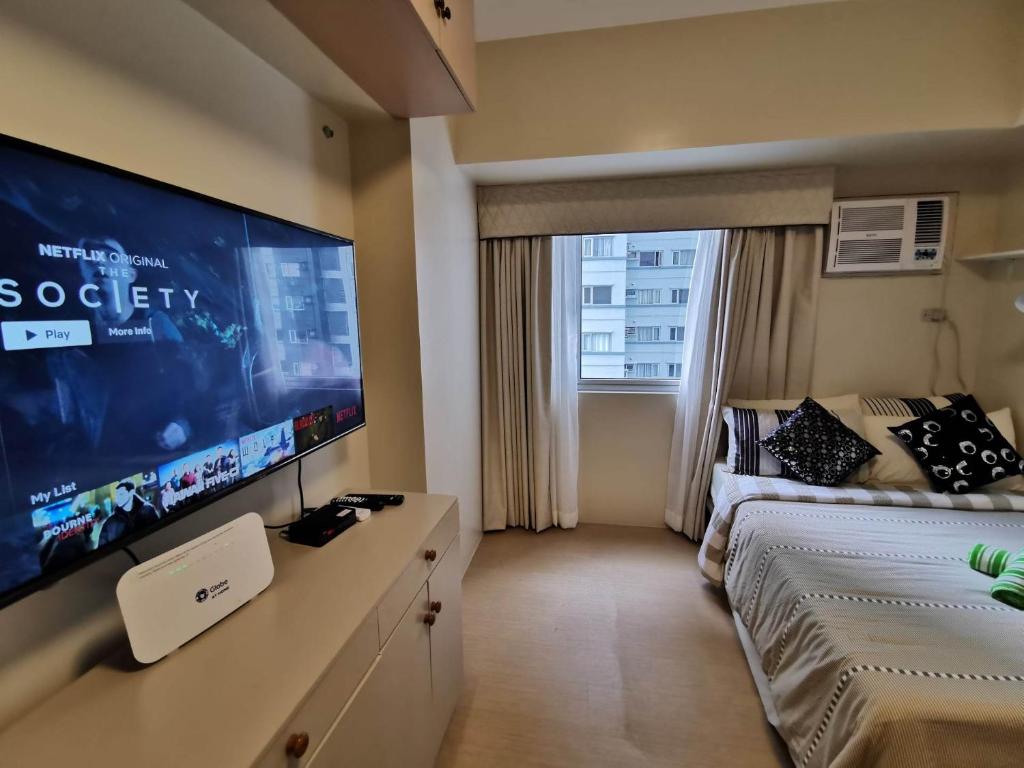 TV a/nebo společenská místnost v ubytování Avida Davao by davaobnb & Lemonique Homes