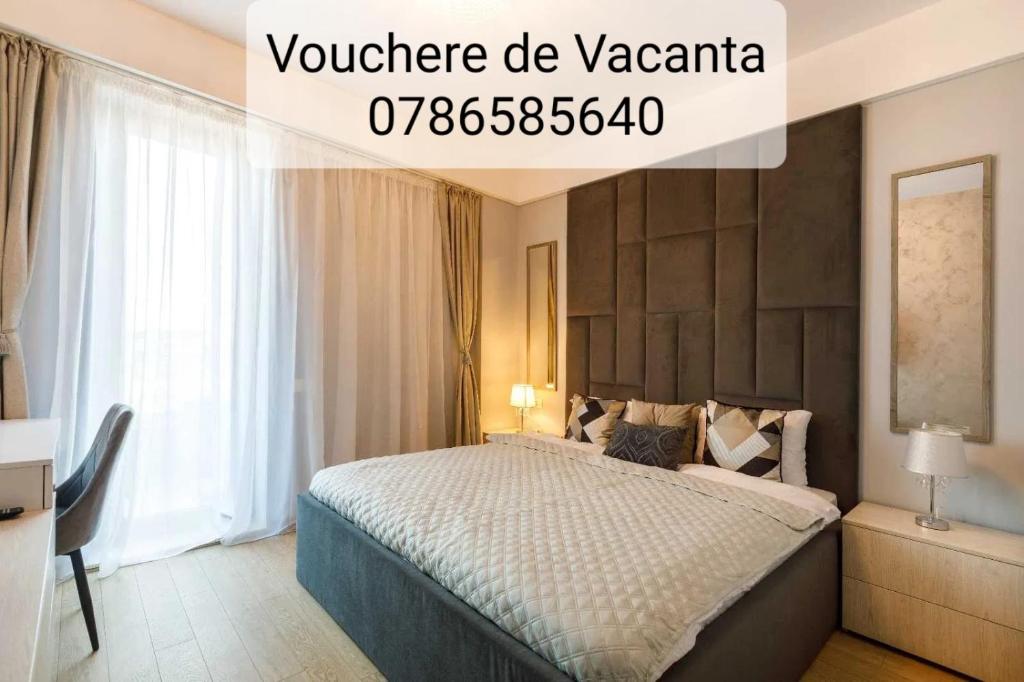 En eller flere senge i et værelse på APARTAMENT YNA