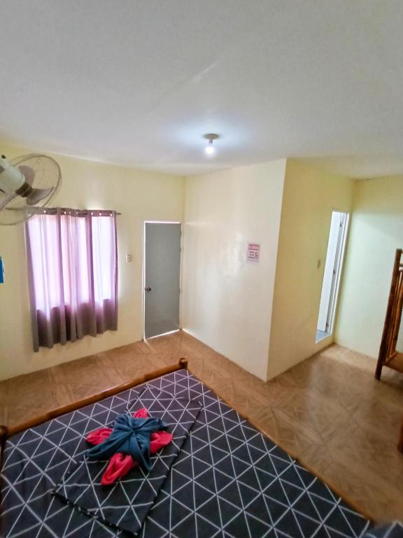 Postel nebo postele na pokoji v ubytování Ander Divers Garden Resort