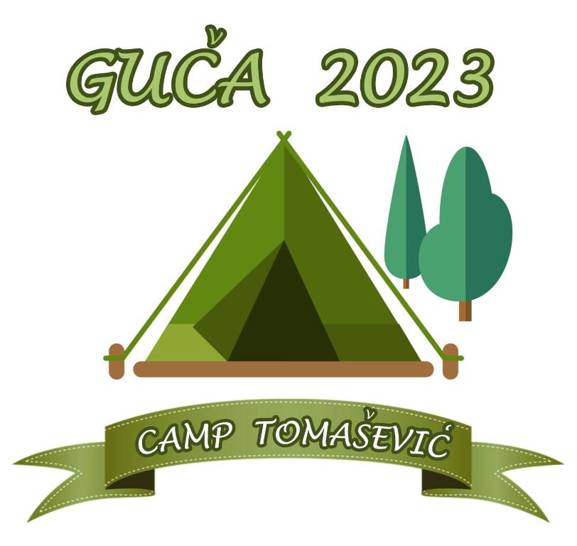 a green tent and a banner for guatemala at Camp Tomasevic in Guča