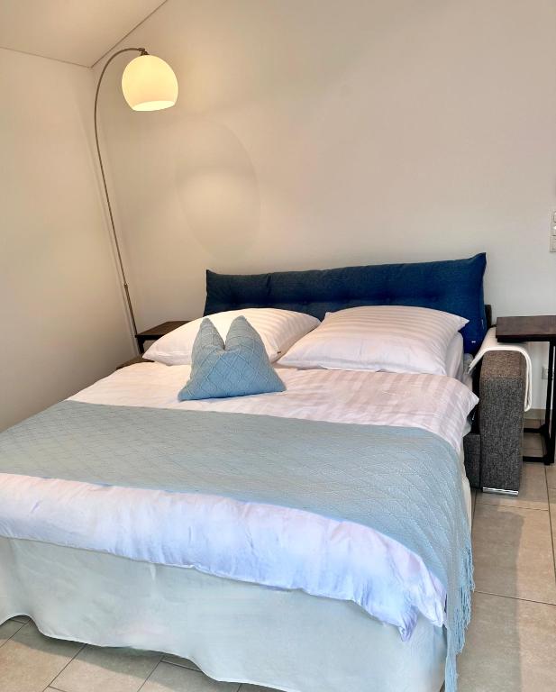 Postel nebo postele na pokoji v ubytování Negrelli Appartement