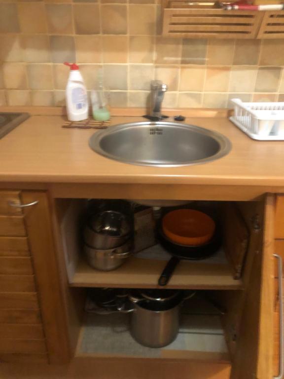 Kuchyňa alebo kuchynka v ubytovaní Zaži Apartmány Fatrapark Hrabovo