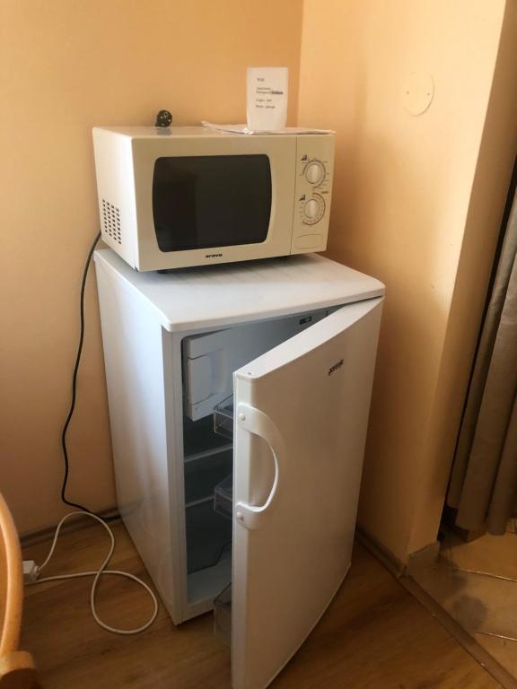 Kuchyňa alebo kuchynka v ubytovaní Zaži Apartmány Fatrapark Hrabovo
