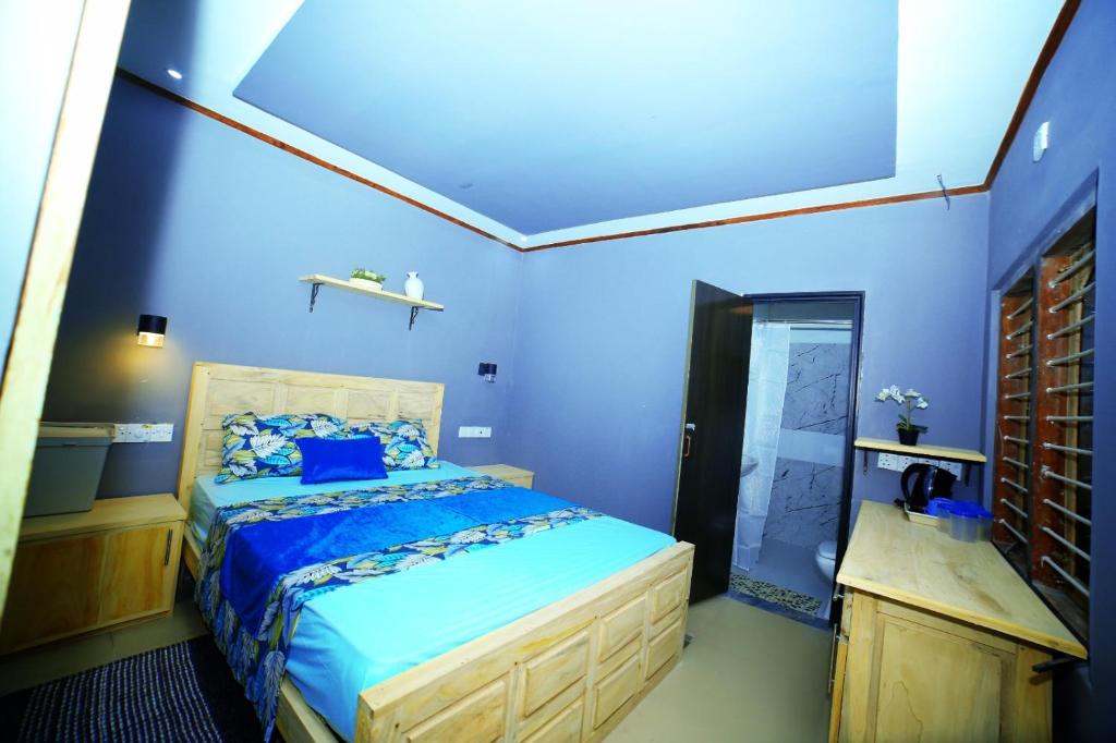 Postel nebo postele na pokoji v ubytování Ammu villa