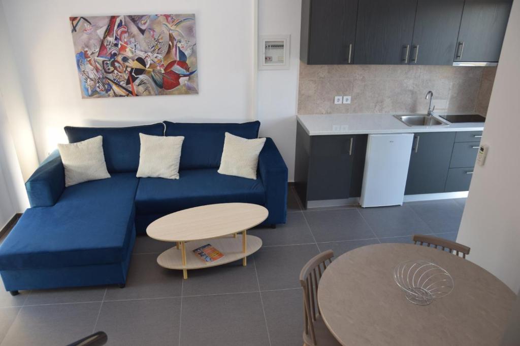 Kuchyň nebo kuchyňský kout v ubytování Olympia Suites