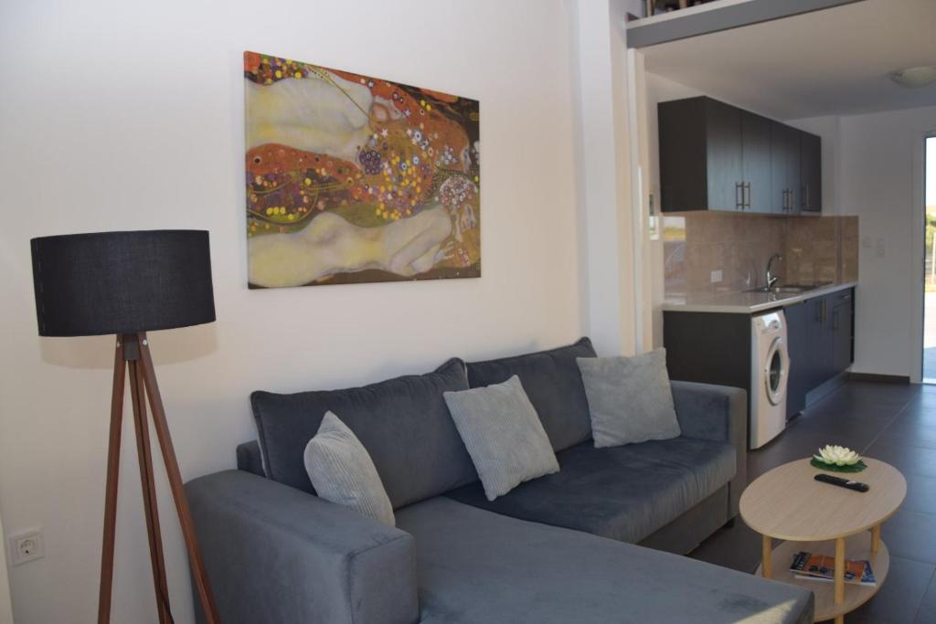 Kuchyň nebo kuchyňský kout v ubytování Olympia Suites
