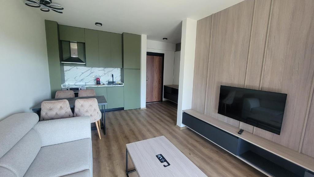 TV a/nebo společenská místnost v ubytování Dulamerovic Hotel