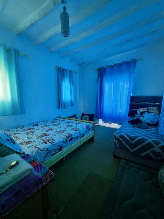 Postel nebo postele na pokoji v ubytování La Belle Etoile