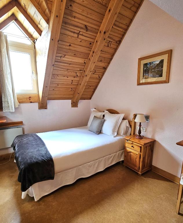 Posteľ alebo postele v izbe v ubytovaní Hotel Anglada