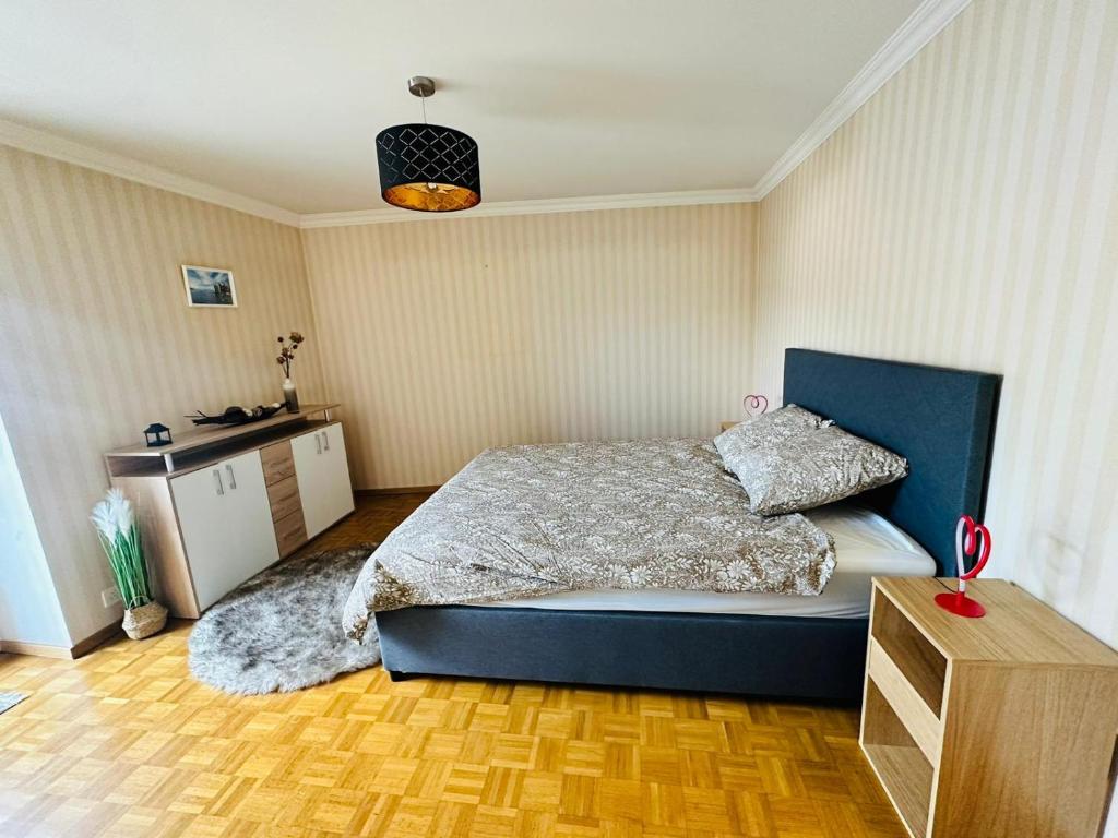 Postel nebo postele na pokoji v ubytování Montreux IX