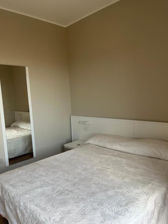 Postel nebo postele na pokoji v ubytování Il primo sasso