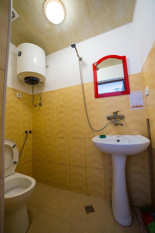 Koupelna v ubytování Guest House Rimma