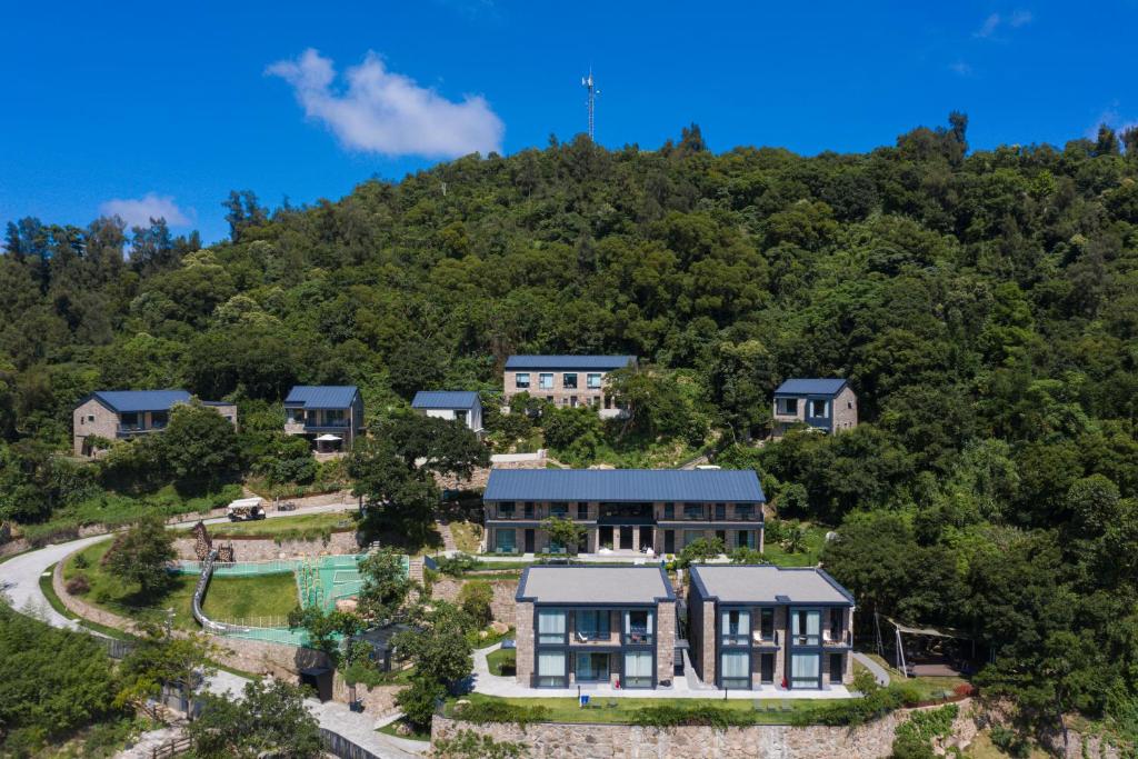 an aerial view of a house on a hill at Wenzhou Ban Hotel in Banping