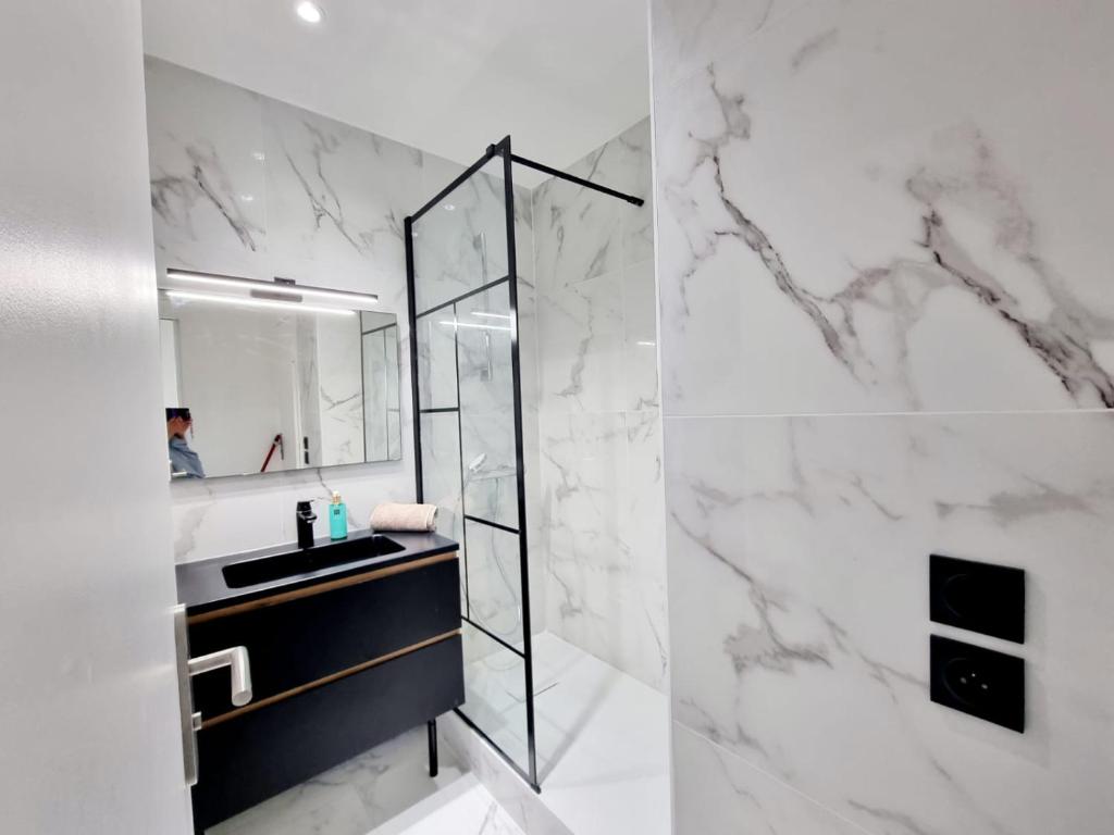 Koupelna v ubytování Appartement moderne et confort