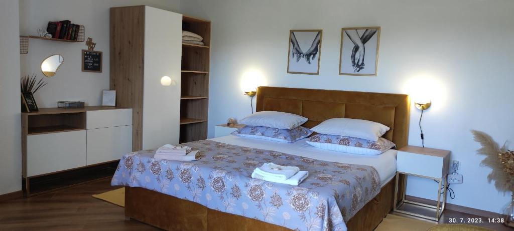 Postel nebo postele na pokoji v ubytování Riviera Rooms and Apartments