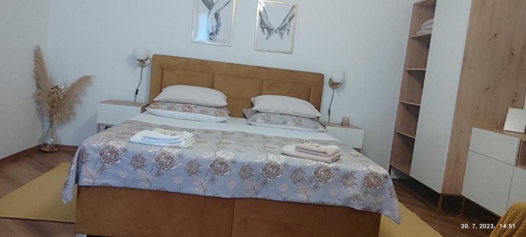 Postel nebo postele na pokoji v ubytování Riviera Rooms and Apartments