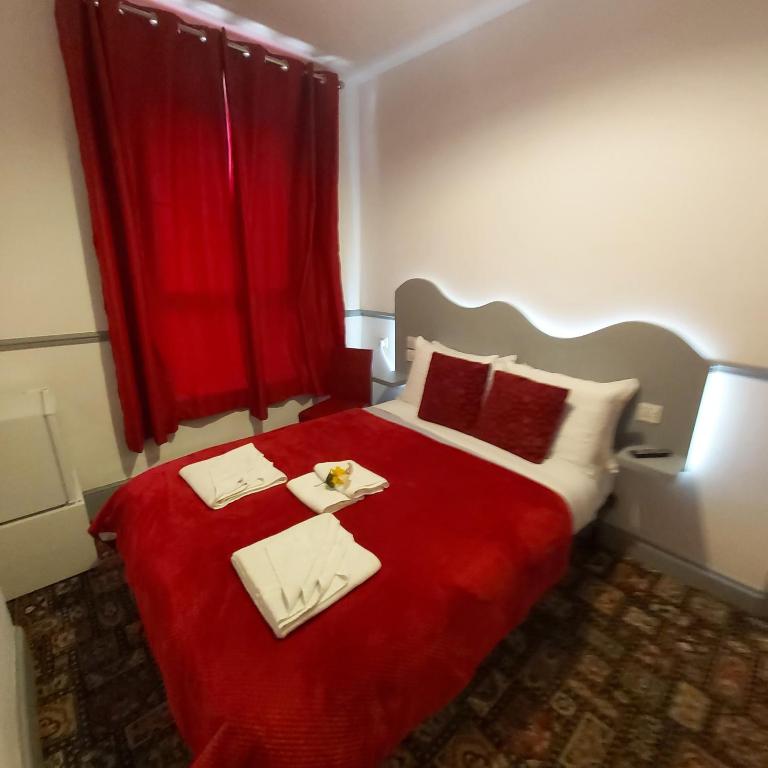 Postel nebo postele na pokoji v ubytování St Albans Guest House, Dover
