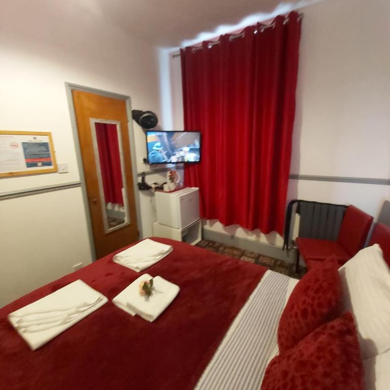 Postel nebo postele na pokoji v ubytování St Albans Guest House, Dover