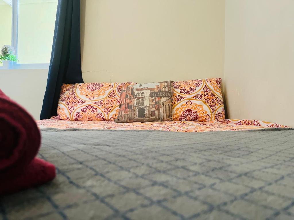 Postel nebo postele na pokoji v ubytování Bon Bini Kokolishi