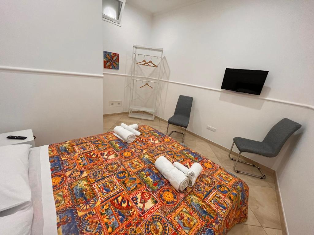 TV a/nebo společenská místnost v ubytování Esse House's Noto