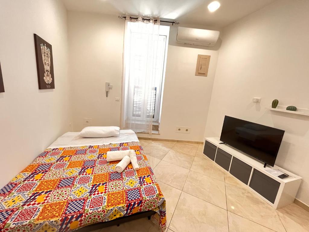 TV a/nebo společenská místnost v ubytování Esse House's Noto