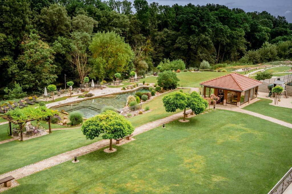 an aerial view of a garden with a gazebo at Penzion Včelařský Dvůr in Lednice