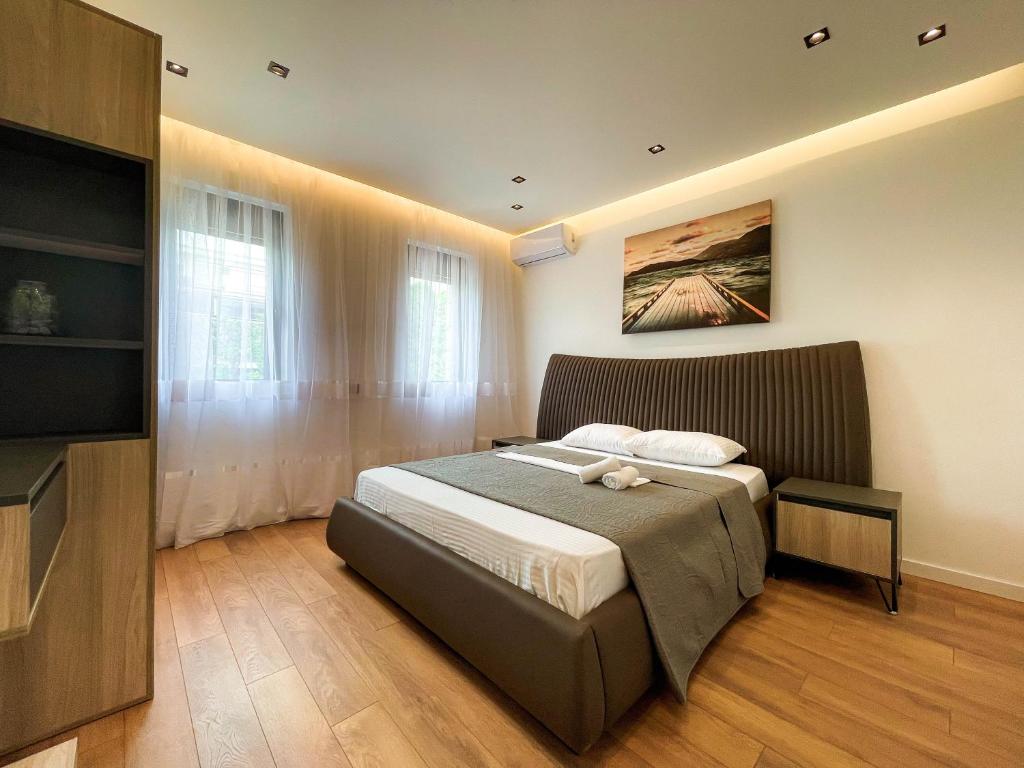 Postel nebo postele na pokoji v ubytování B&B Lovac Hasa 2
