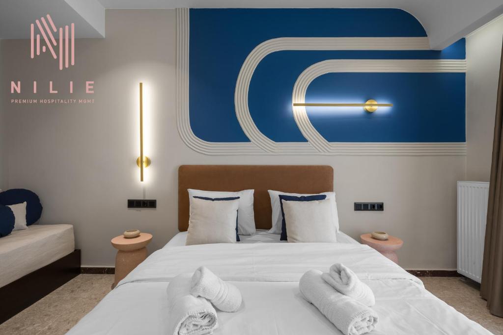 Ένα ή περισσότερα κρεβάτια σε δωμάτιο στο Terrakotta, Nilie Hospitality MGMT