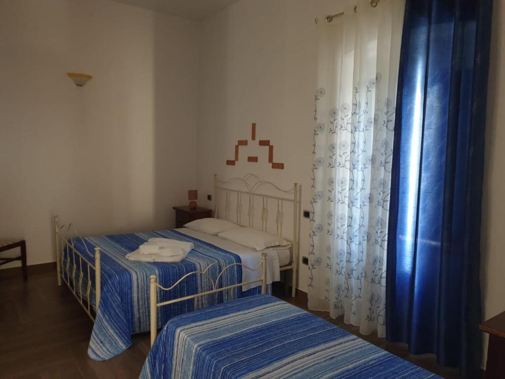 Postel nebo postele na pokoji v ubytování IL PRINCIPE