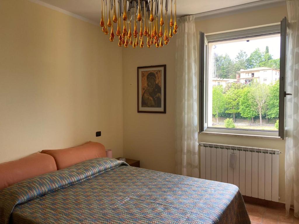 Postel nebo postele na pokoji v ubytování appartamento