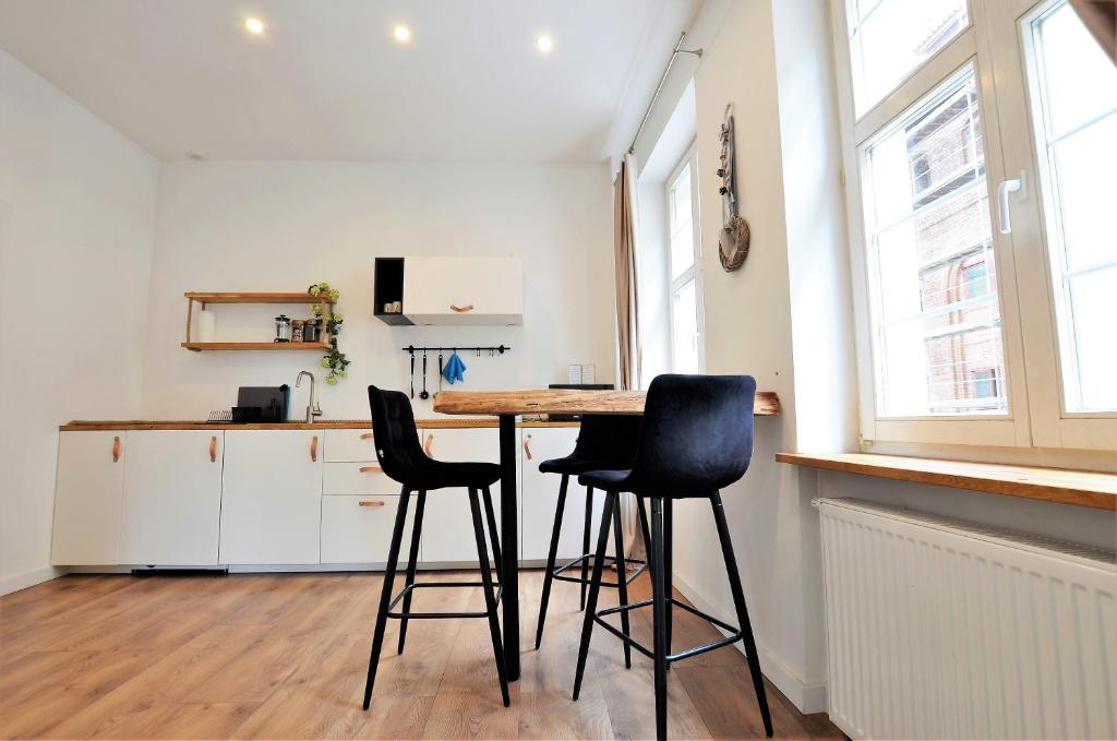 Kuchyňa alebo kuchynka v ubytovaní Apartament Szeroka Old Town