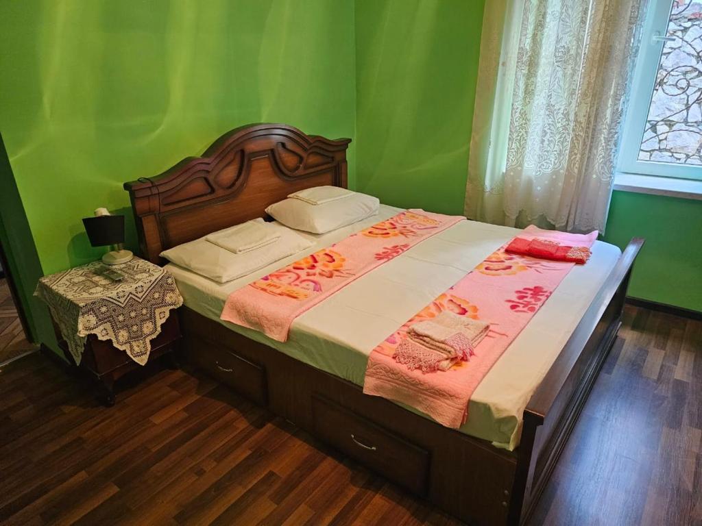 Postel nebo postele na pokoji v ubytování Guest House AMO
