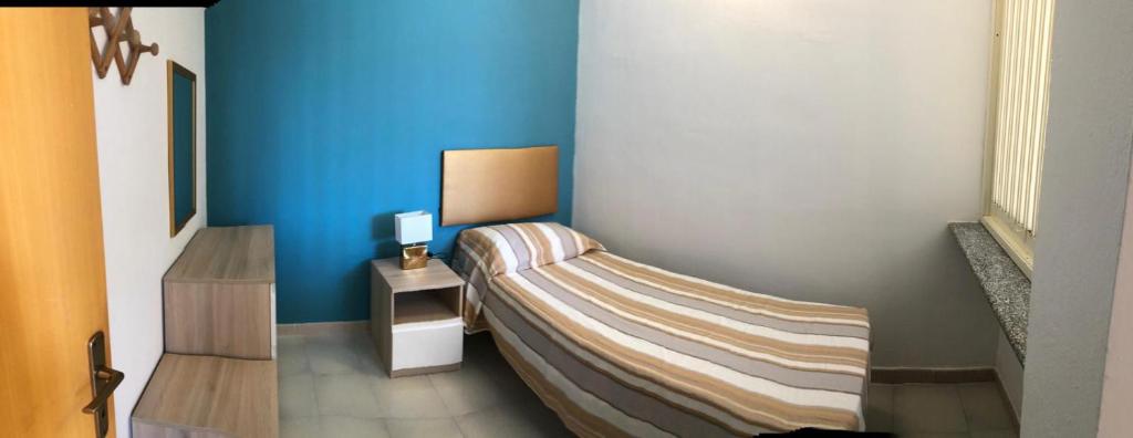 Cama ou camas em um quarto em Villa Dacla