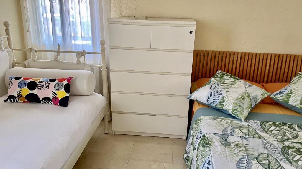 Postel nebo postele na pokoji v ubytování H1-Habitación sublime cama doble luminosa A/C WIFI
